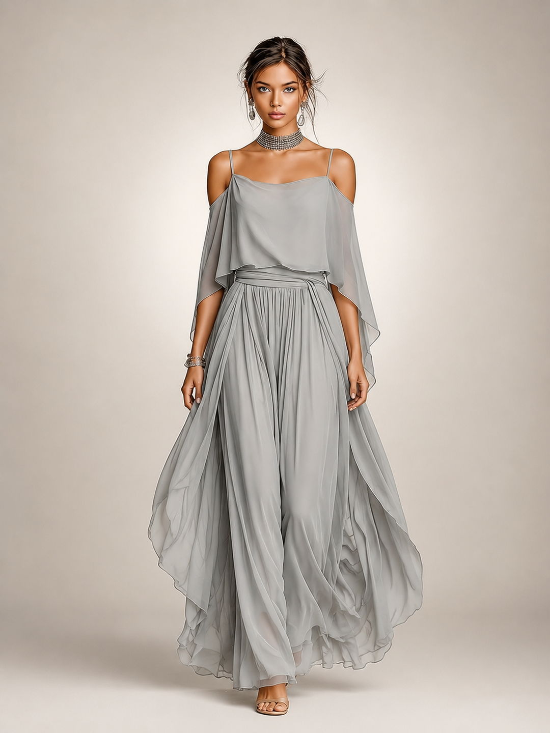 Femme portant un ensemble en mousseline avec haut épaules dénudées et pantalon large, coloris gris