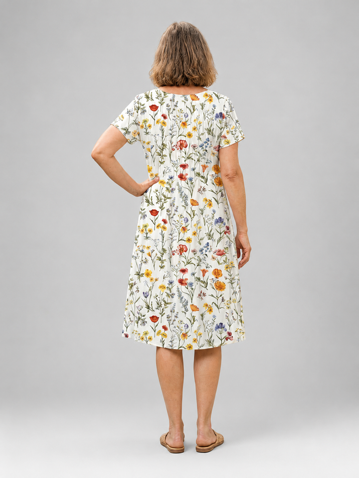 Mirabelle — Robe midi fleurie à poches