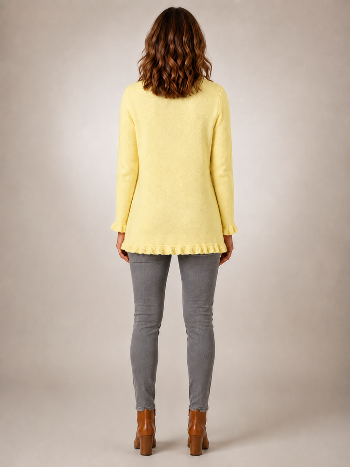 Lillian | Veste crème en maille côtelée à volants