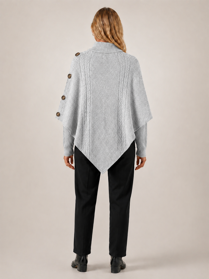 Apolline | Poncho col roulé en maille torsadée à boutons