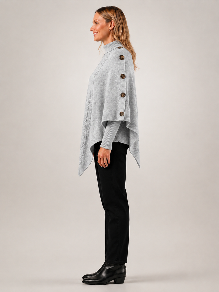 Apolline | Poncho col roulé en maille torsadée à boutons