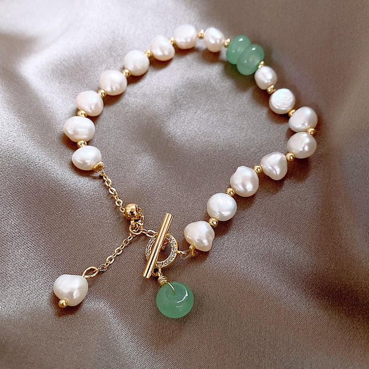 Estran | Bracelet avec détails blancs et pierres vertes – Vue 03