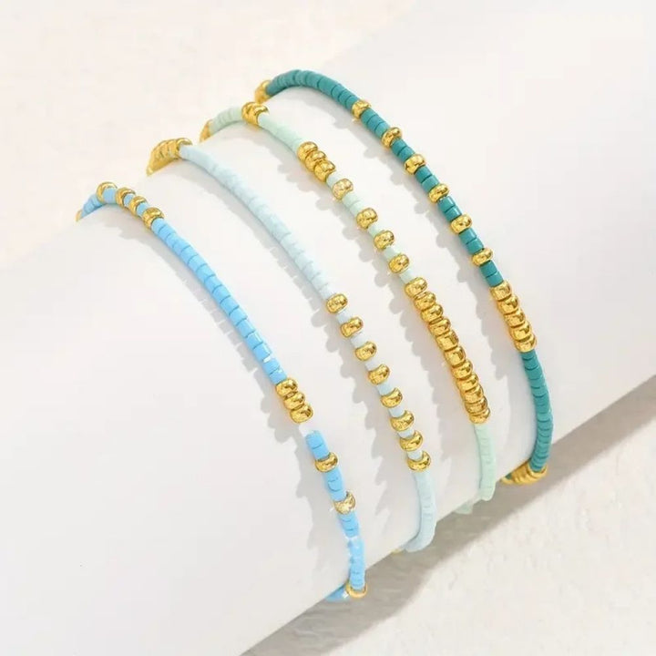Brise du Large | Ensemble de bracelets fins dans des tons turquoise et vert menthe – Vue 02