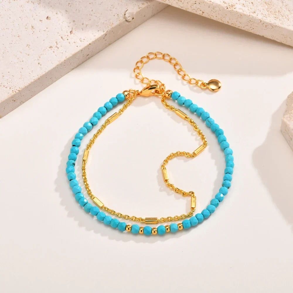 Double Chaîne | Bracelet double doré avec perles turquoise – Vue 01