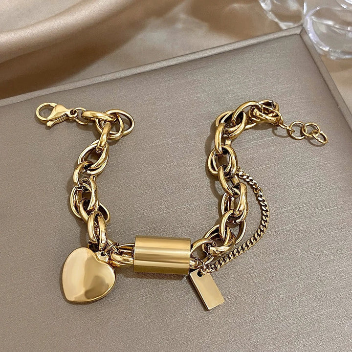 Cadenas Cœur | Bracelet chaîne épais avec pendentif cœur et chaînette de sécurité – Vue 04