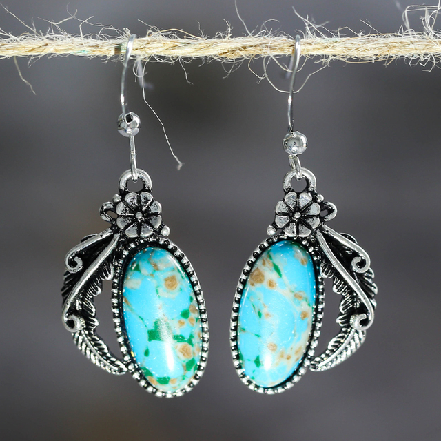 Ovale Plume | Boucles d'oreilles argentées avec pierre turquoise – Vue 01