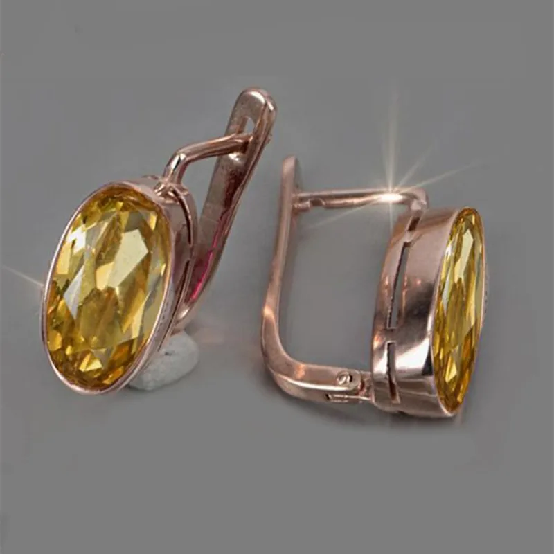 Jaune Ambré | Boucles d'oreilles en or rose avec pierres jaunes – Vue 01