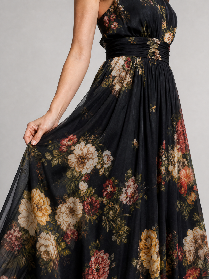 Agnès — Robe longue dos nu à fleurs sur fond noir